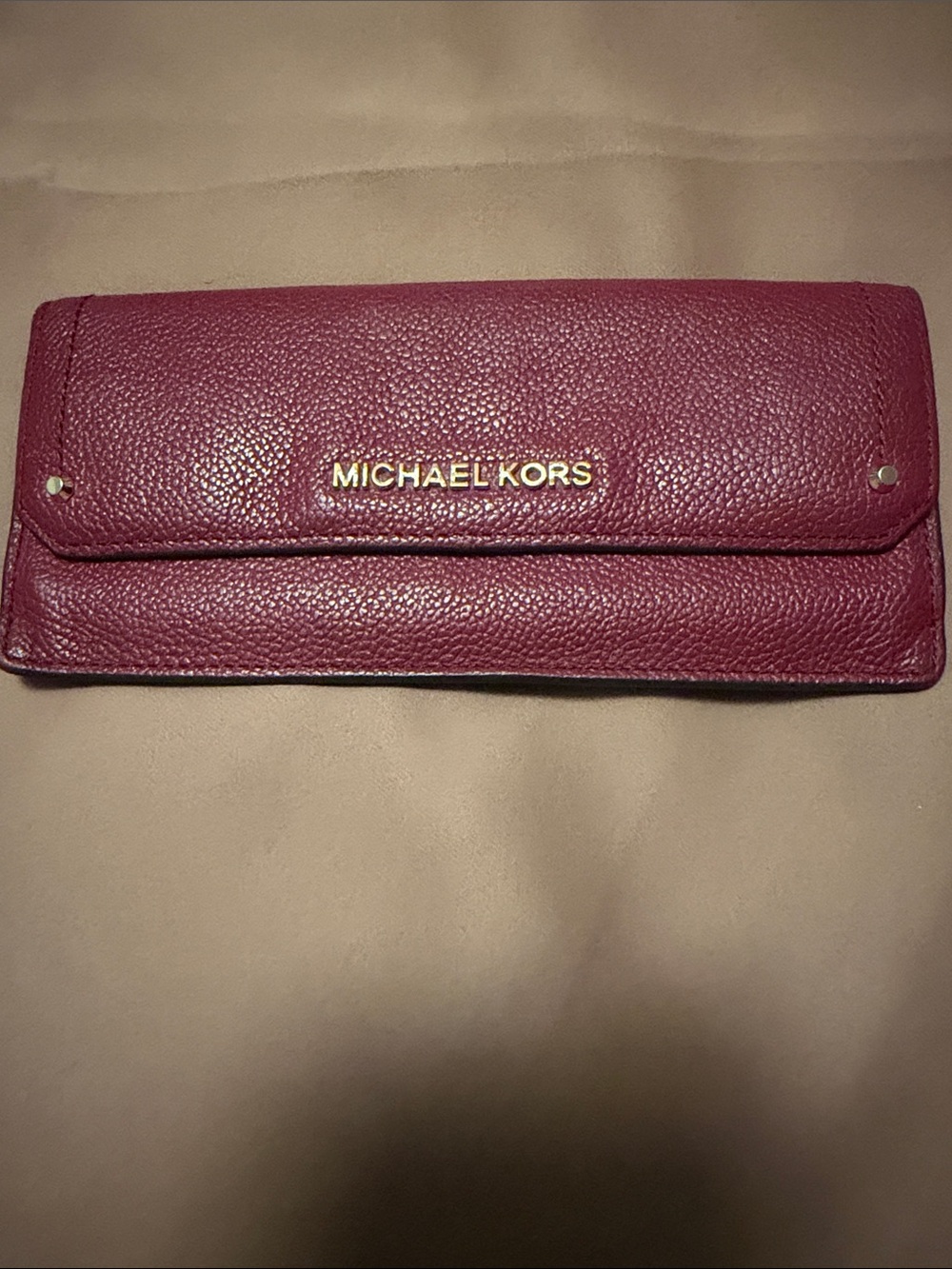 Michael Kors Burgundy Pebbled Leather Continental Wallet with Gold Logo